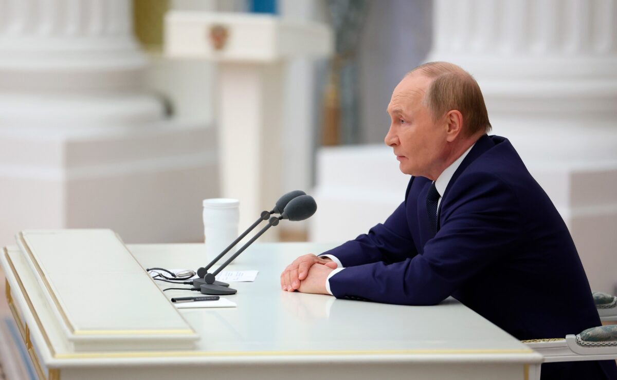 путін